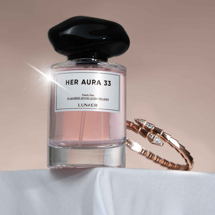 her aura + amber musk